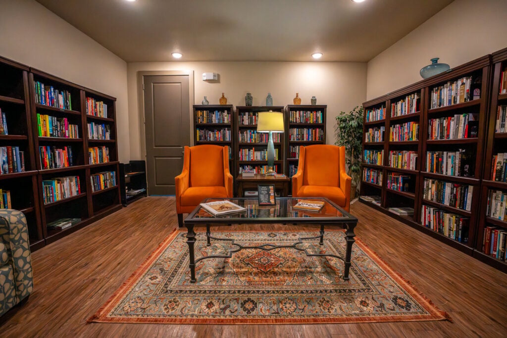 Library Room with Reading Corner at Senior Living in San Antonio